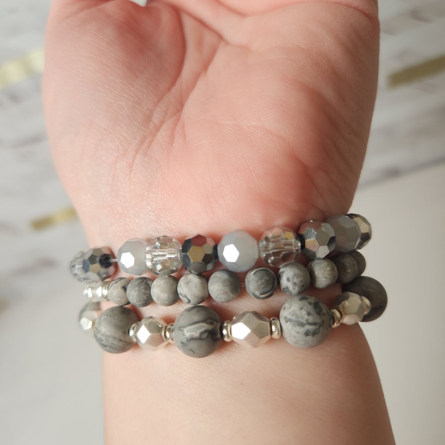 Semi Precious Set of Three Beaded Bracelets With Hammered Cross Focal